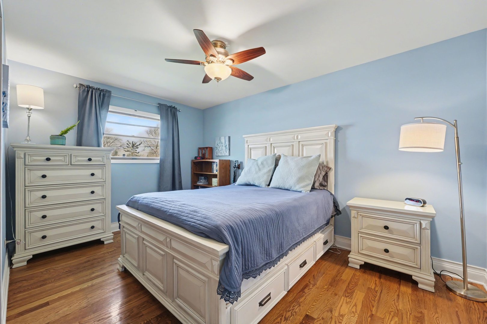 3604 192nd Street Lansing, IL 60438 - Photo 16 of 29 a bedroom with a bed and a dresser
