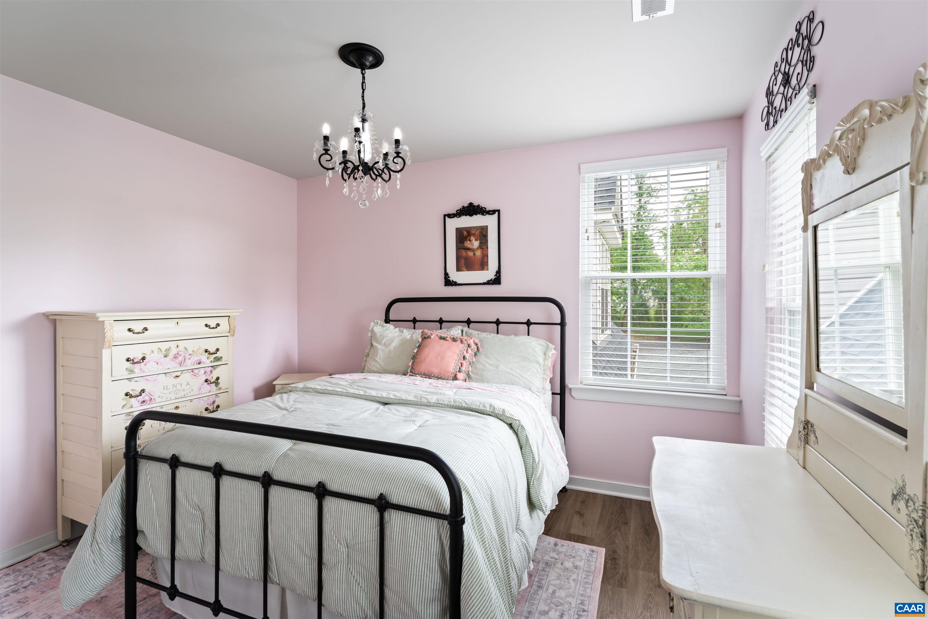 1760 Haden Martin Road Palmyra, VA 22963 - Photo 36 of 51 a bedroom with a large bed and a window