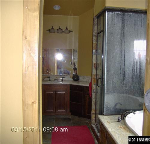 2620 Castle Peak Road Reno, NV 89521 - Photo 10 of 10 a bathroom with a sink a toilet and shower