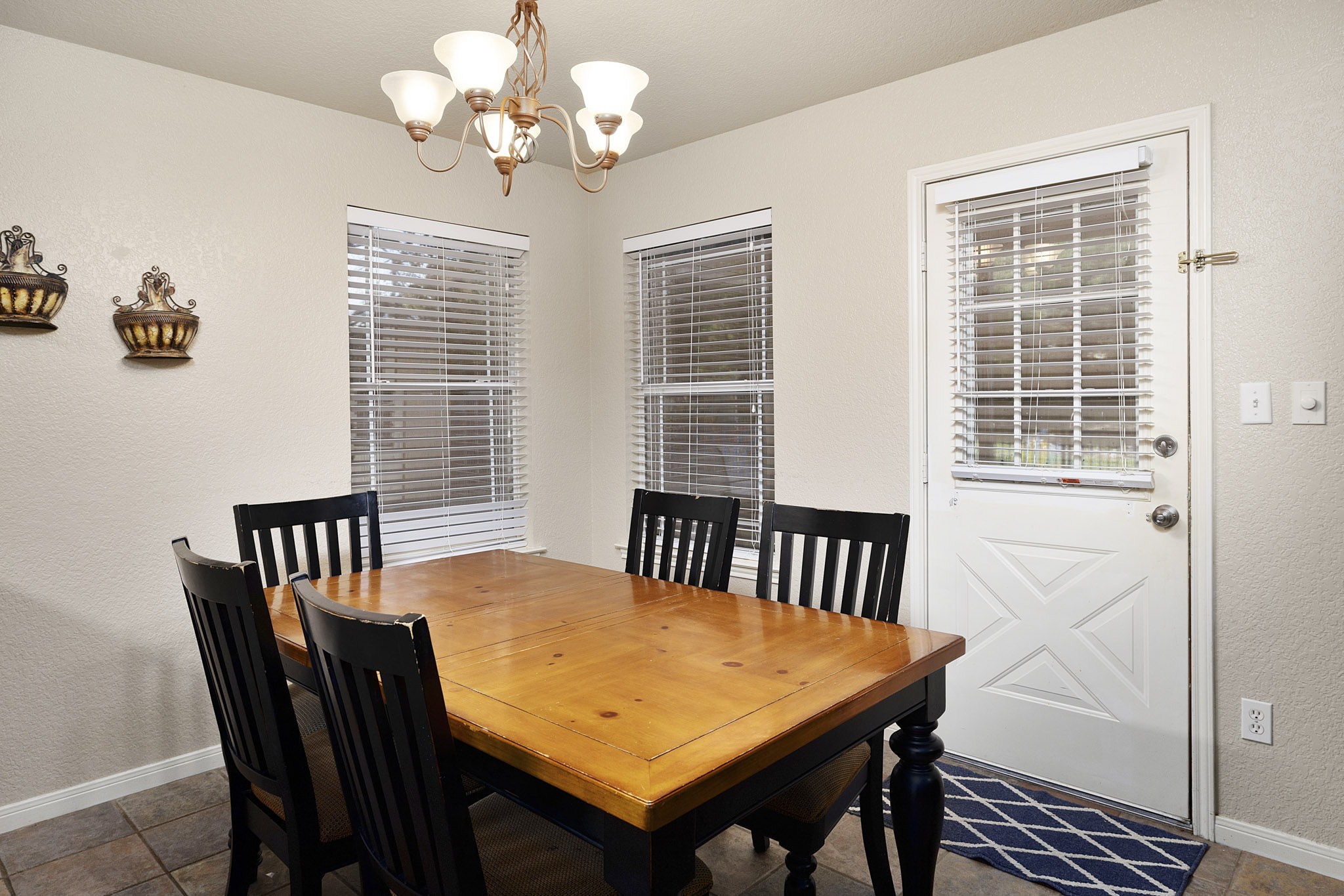 110 Hunter Ridge Road San Marcos, TX 78666 - Photo 14 of 40 Dining room open to the living room and kitchen