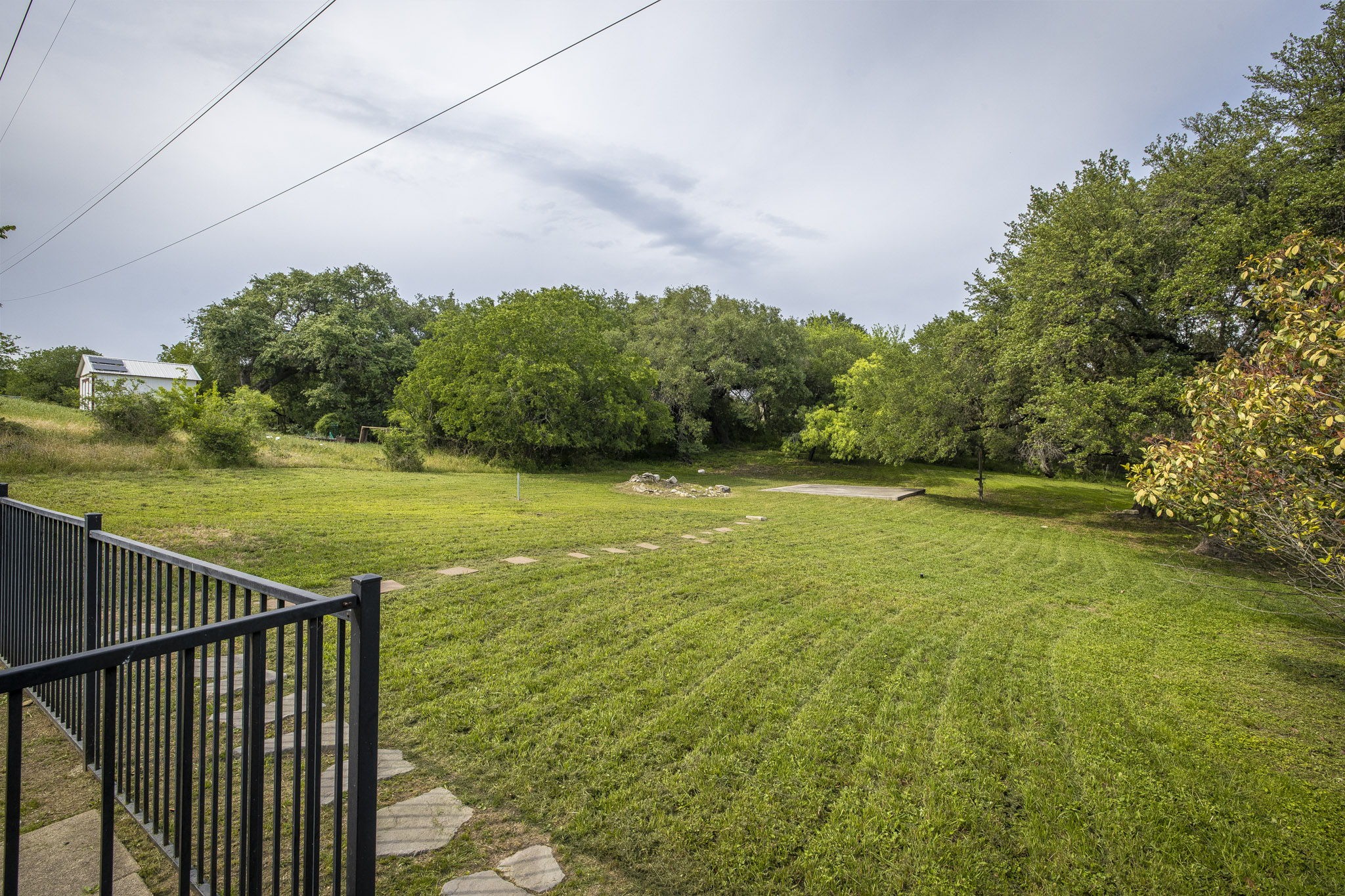 110 Hunter Ridge Road San Marcos, TX 78666 - Photo 5 of 40 Vibrant greenery all throughout the lot!