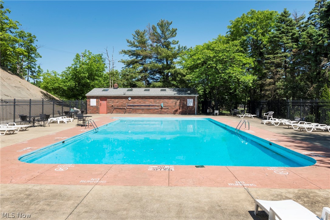 6484 State Road Parma, OH 44134 - Photo 35 of 36 Large community pool for recreation and relaxation.