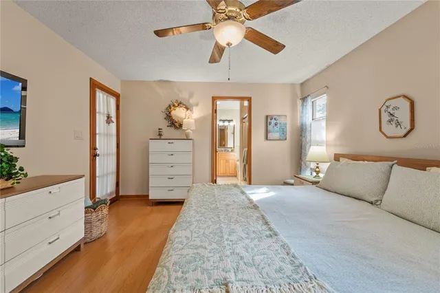 a bath tub sitting next to a shower