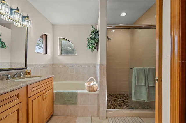 a bed room with furniture and a window