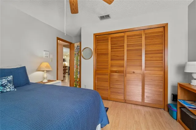 a view of room with furniture and wooden floor