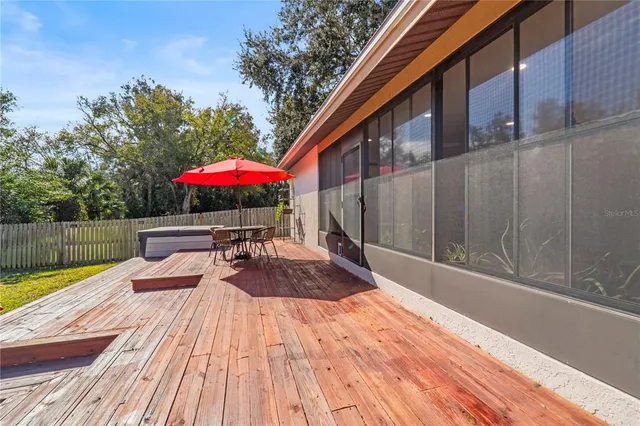 an aerial view of residential building with green space