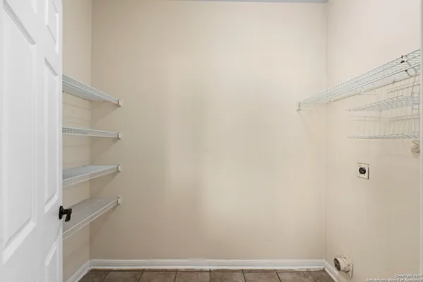 a view of small space with racks on the wall