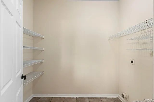 a view of small space with racks on the wall