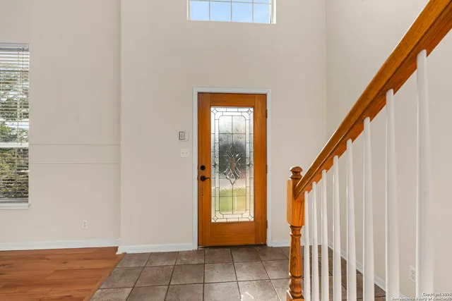 a view of an entryway with staircase