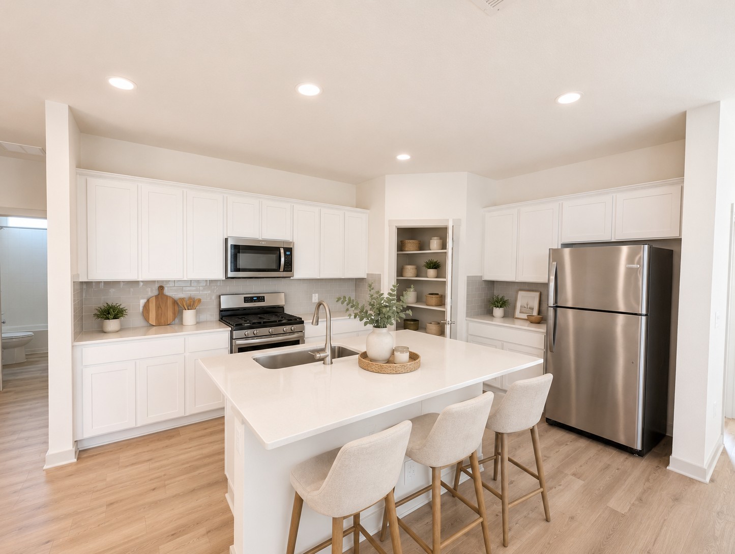 261 Century Plant Road Leander, TX 78641 - Photo 2 of 25 Virtually staged Culinary adventures await in this naturally illuminated kitchen with plentiful counter space.