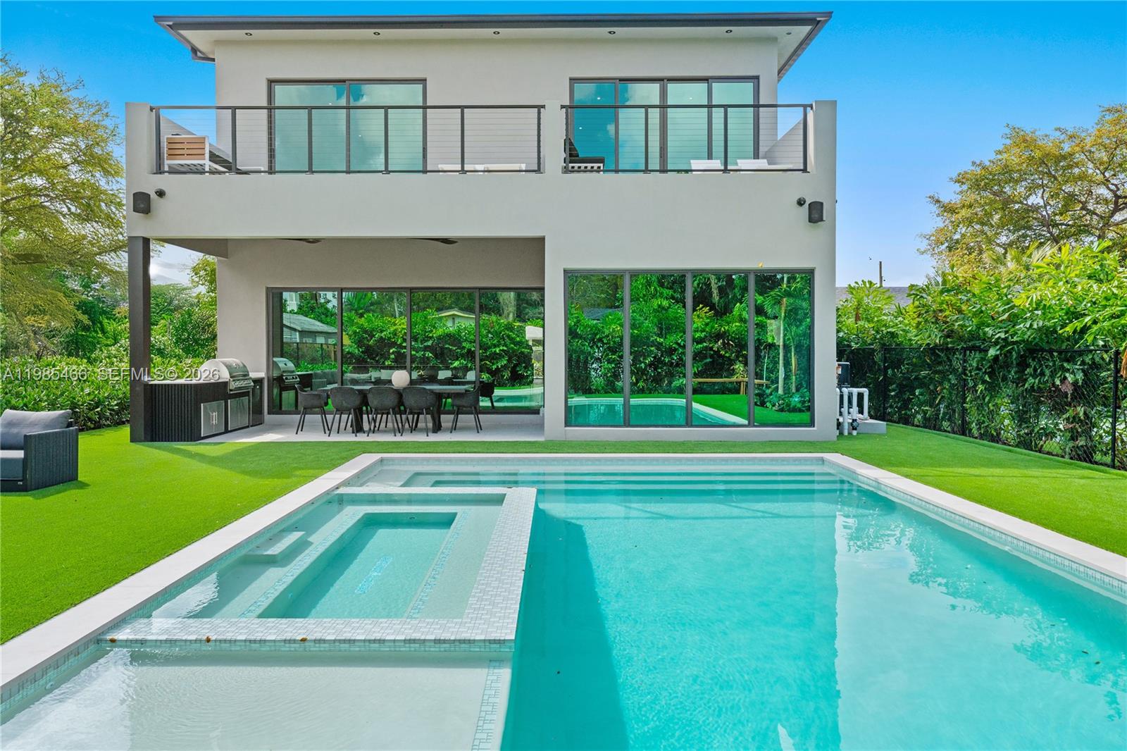 245 Northeast 116th Street Miami, FL 33161 - Photo 1 of 48 a view of a house with a swimming pool