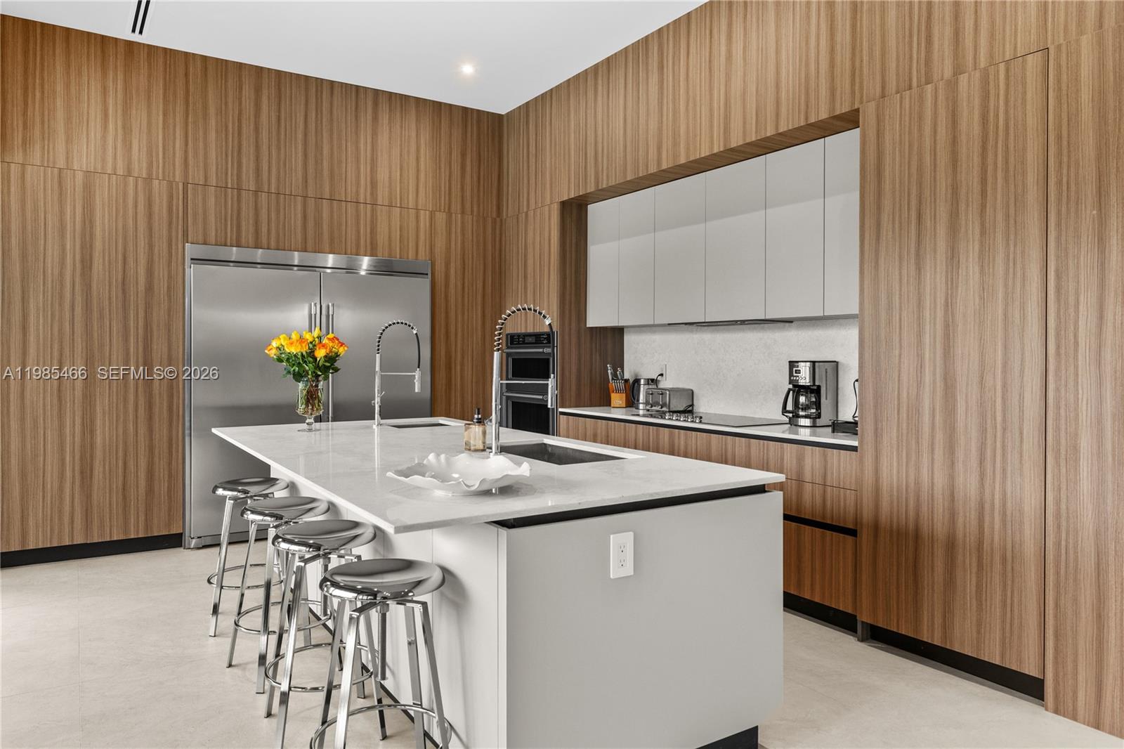 245 Northeast 116th Street Miami, FL 33161 - Photo 13 of 48 a kitchen with stainless steel appliances granite countertop a sink a stove and a refrigerator