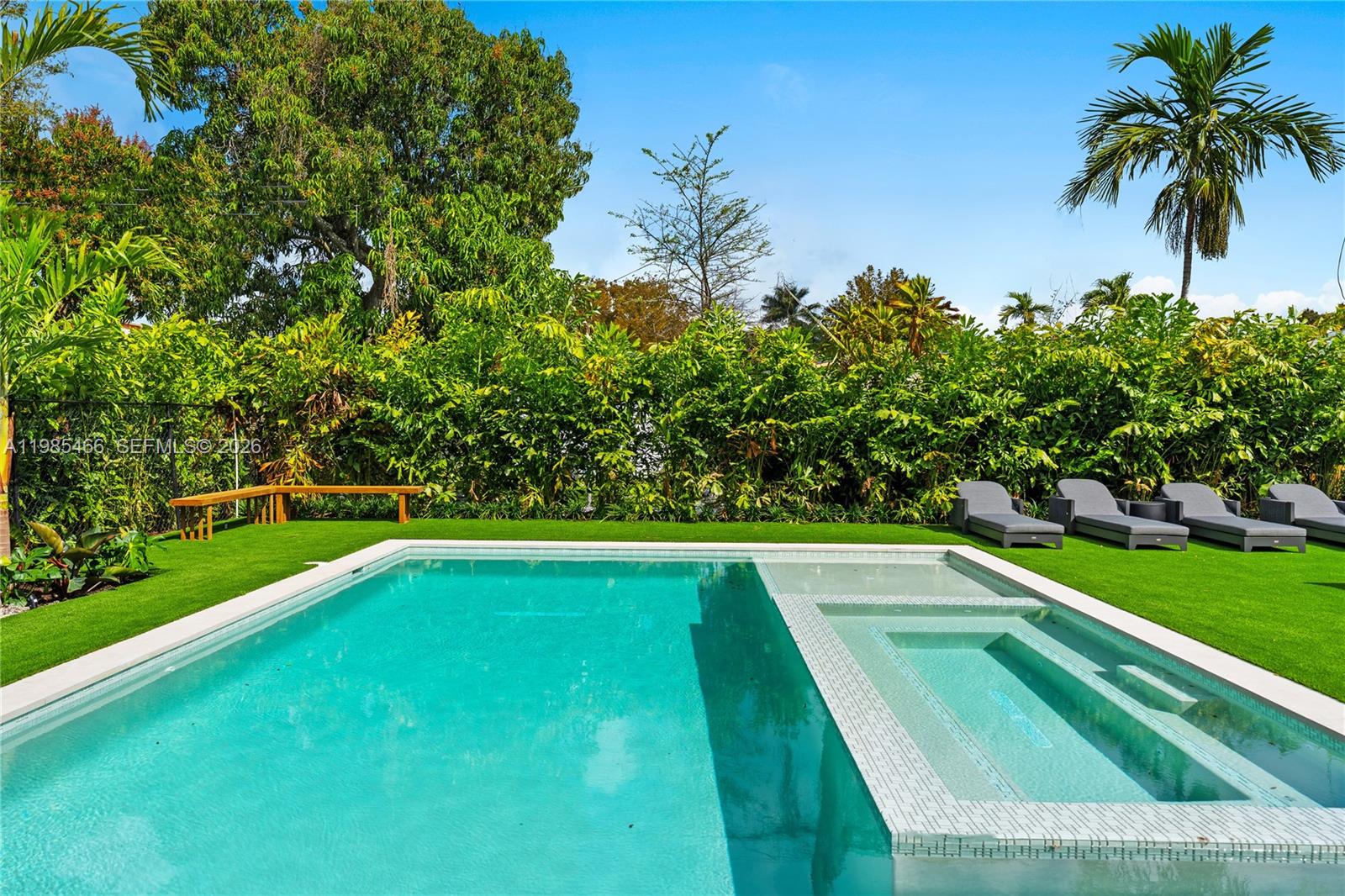 245 Northeast 116th Street Miami, FL 33161 - Photo 4 of 48 a view of outdoor space swimming pool and lake view