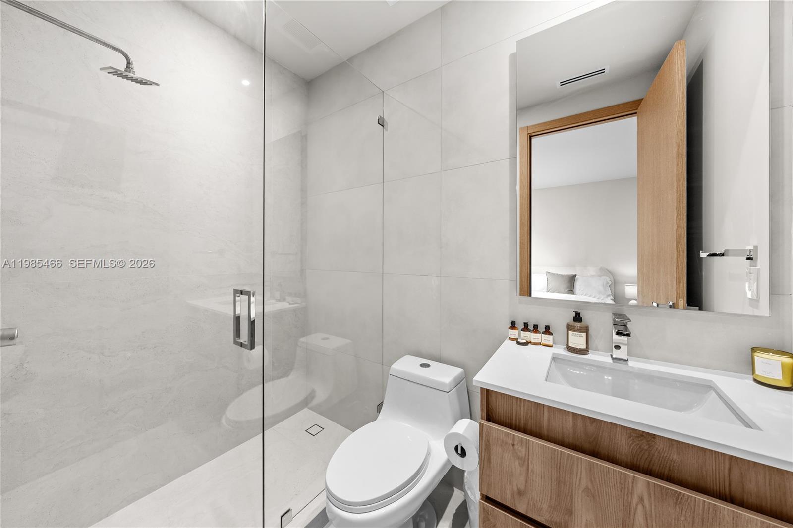 245 Northeast 116th Street Miami, FL 33161 - Photo 46 of 48 a bathroom with a sink toilet and shower