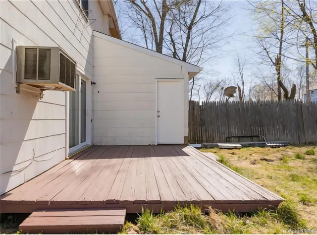a view of a backyard of the house