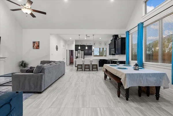 a living room with furniture and a table