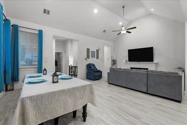 a kitchen with stainless steel appliances a sink stove and refrigerator