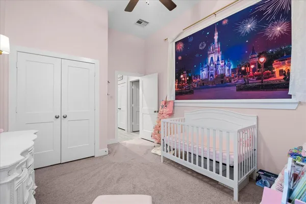 a bathroom with a sink toilet vanity and shower