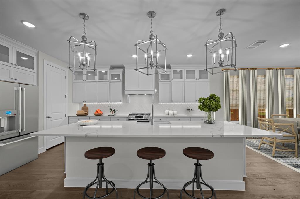 11549 Wulstone Road Fort Worth, TX 76052 - Photo 7 of 35 a kitchen with stainless steel appliances granite countertop a kitchen island a stove and a cabinets