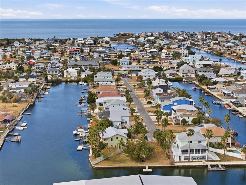 4064 Casa Court Hernando Beach, FL 34607 - Photo 20 of 32 an aerial view of residential houses with outdoor space
