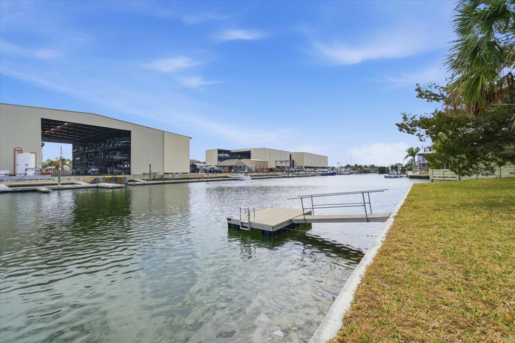 4064 Casa Court Hernando Beach, FL 34607 - Photo 27 of 32 a view of a lake with a house