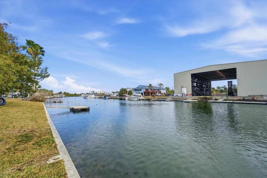 4064 Casa Court Hernando Beach, FL 34607 - Photo 30 of 32 a view of a lake with houses