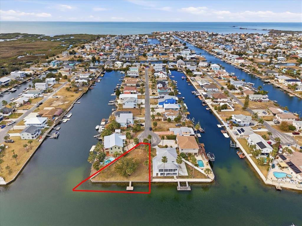 4064 Casa Court Hernando Beach, FL 34607 - Photo 6 of 32 an aerial view of residential houses with outdoor space