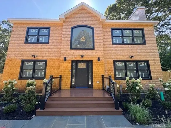a front view of a house having yard