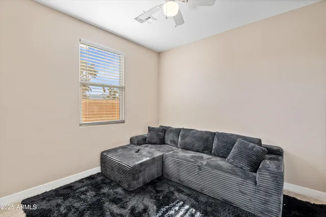 a bathroom with a sink a large mirror and a