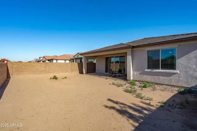 a view of a balcony with furniture