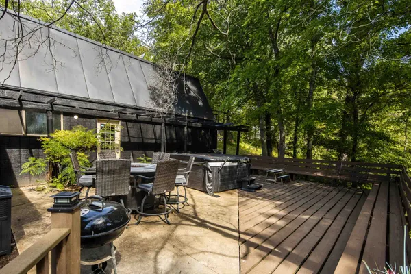 a view of backyard with sitting area