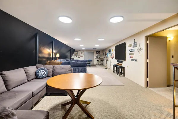 a bedroom with two beds and a window