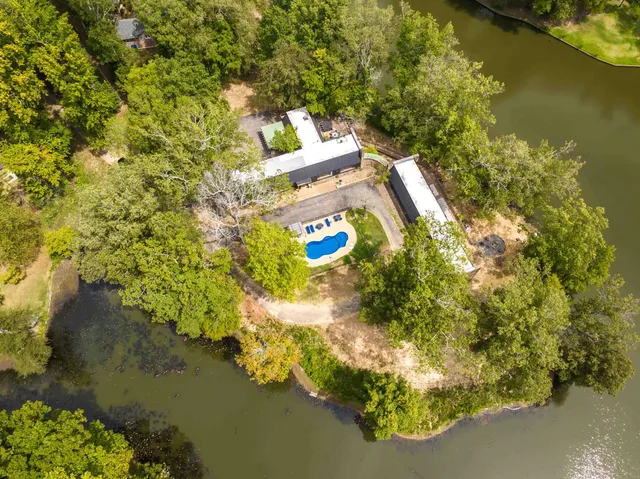 a view of residential houses with lake view