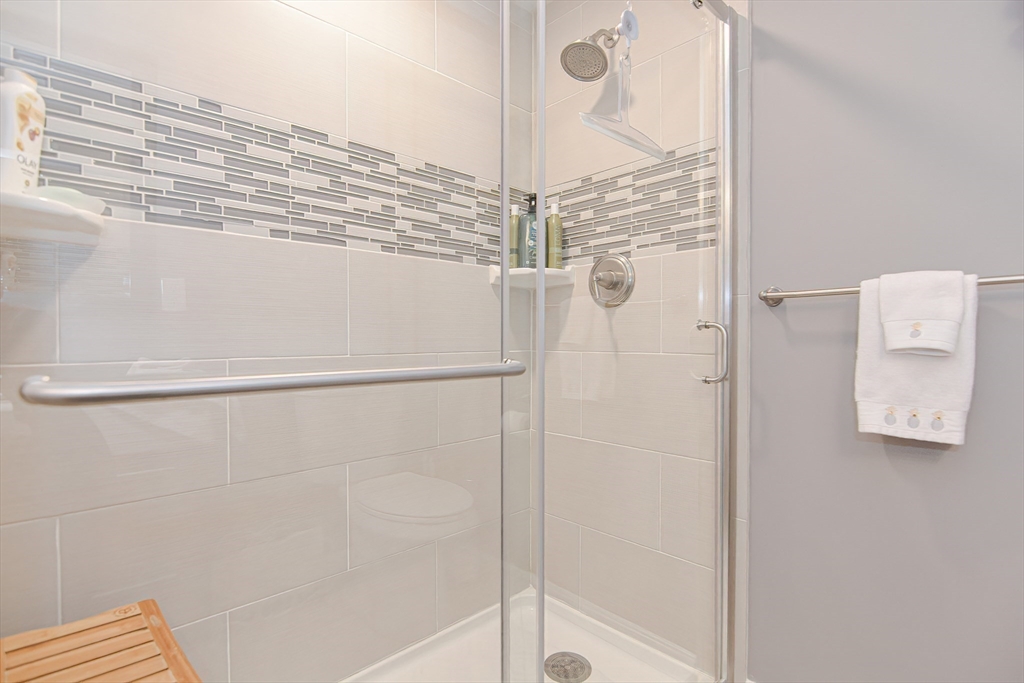 61 Mill Pond, Unit 61 North Andover, MA 01845 - Photo 11 of 31 a bathroom with a shower