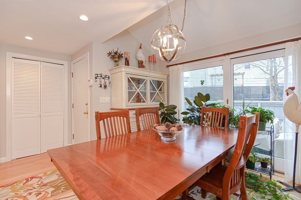 61 Mill Pond, Unit 61 North Andover, MA 01845 - Photo 8 of 31 a view of a dining room with furniture window and outside view