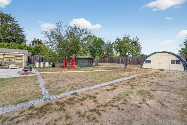 a view of swimming pool with a yard