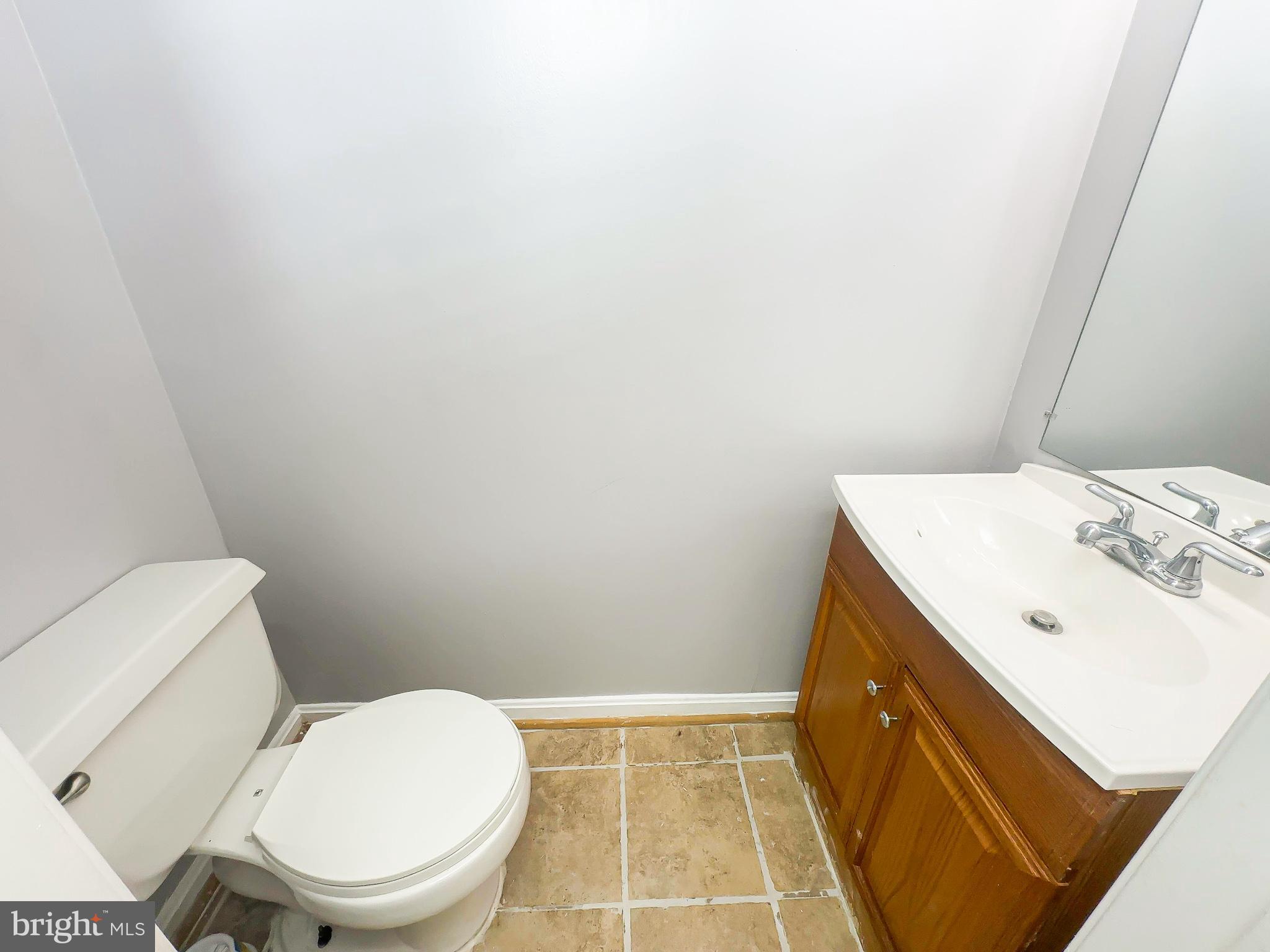 3714 Silver Park Court Suitland, MD 20746 - Photo 13 of 26 a bathroom with a sink and a toilet