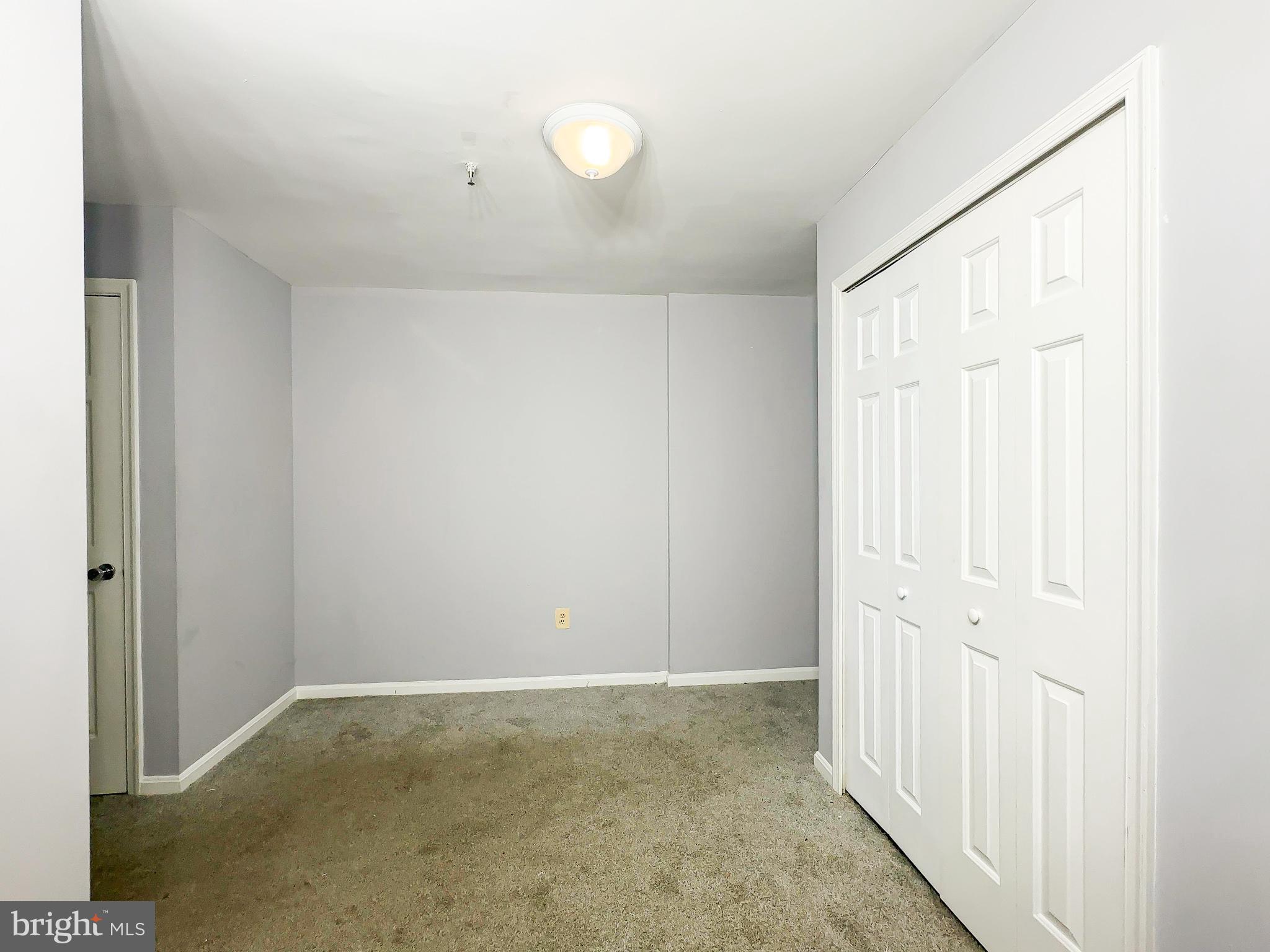 3714 Silver Park Court Suitland, MD 20746 - Photo 22 of 26 an empty room with windows