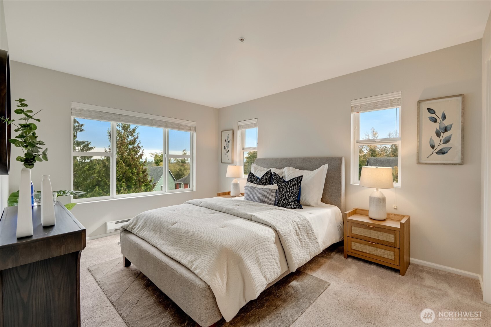 2800 Southwest Raymond Street, Unit 207 Seattle, WA 98126 - Photo 22 of 38 a bedroom with a bed and large window