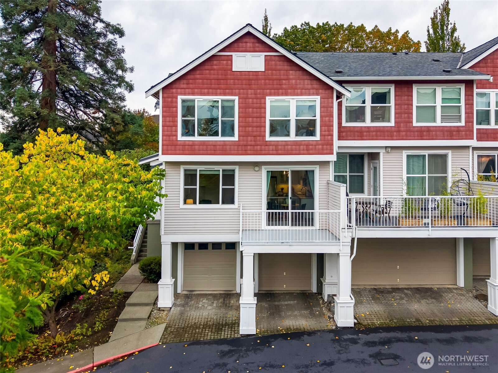 2800 Southwest Raymond Street, Unit 207 Seattle, WA 98126 - Photo 30 of 38 a front view of a house with porch