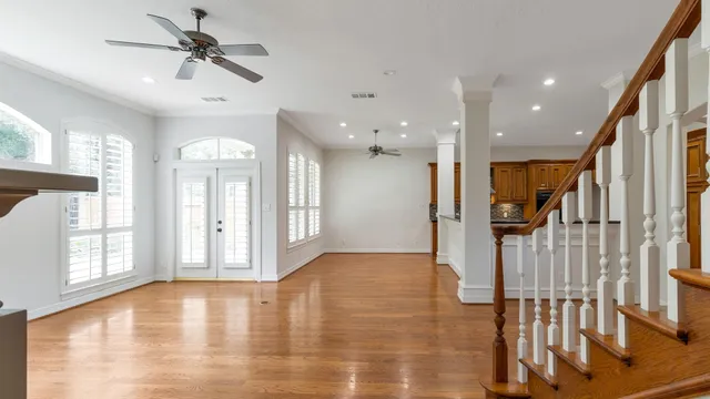 a view of gallery with wooden floor