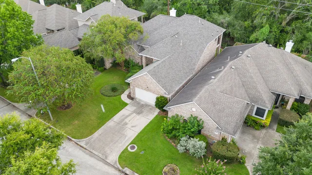 an aerial view of a house with a garden view