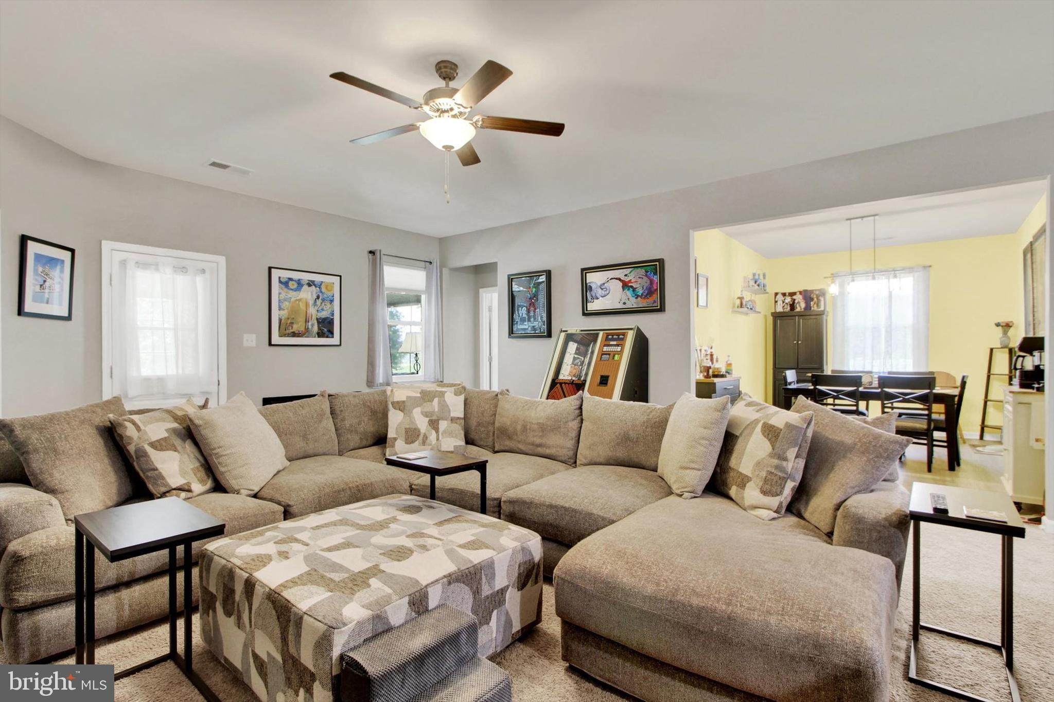 626 Ledger Drive Hanover, PA 17331 - Photo 11 of 37 a living room with furniture ceiling fan and a window