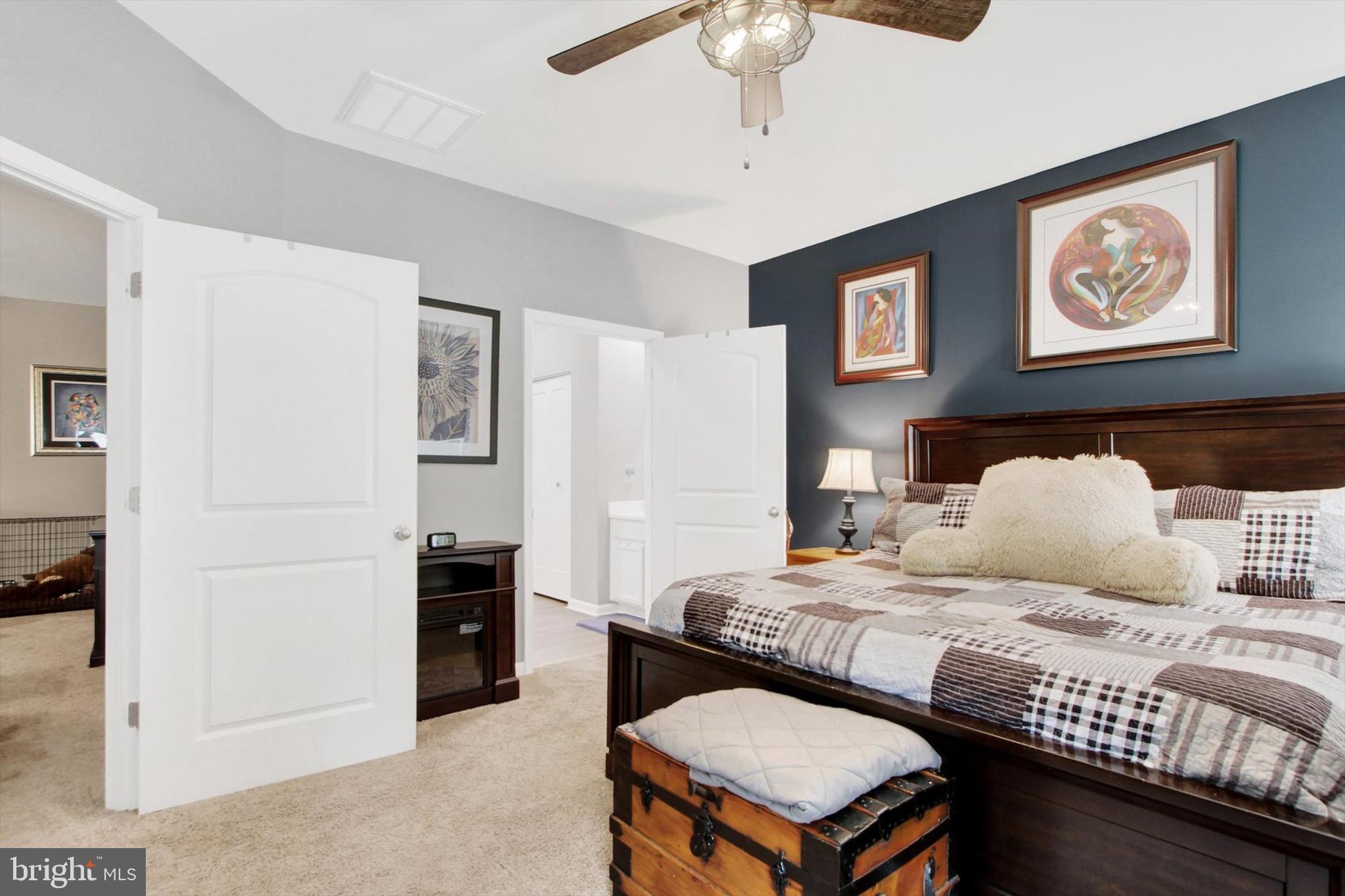626 Ledger Drive Hanover, PA 17331 - Photo 21 of 37 a bedroom with a bed and a chandelier