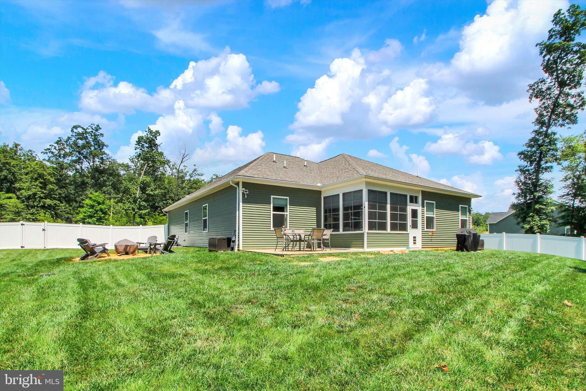 626 Ledger Drive Hanover, PA 17331 - Photo 25 of 37 a view of a house with a yard and sitting area