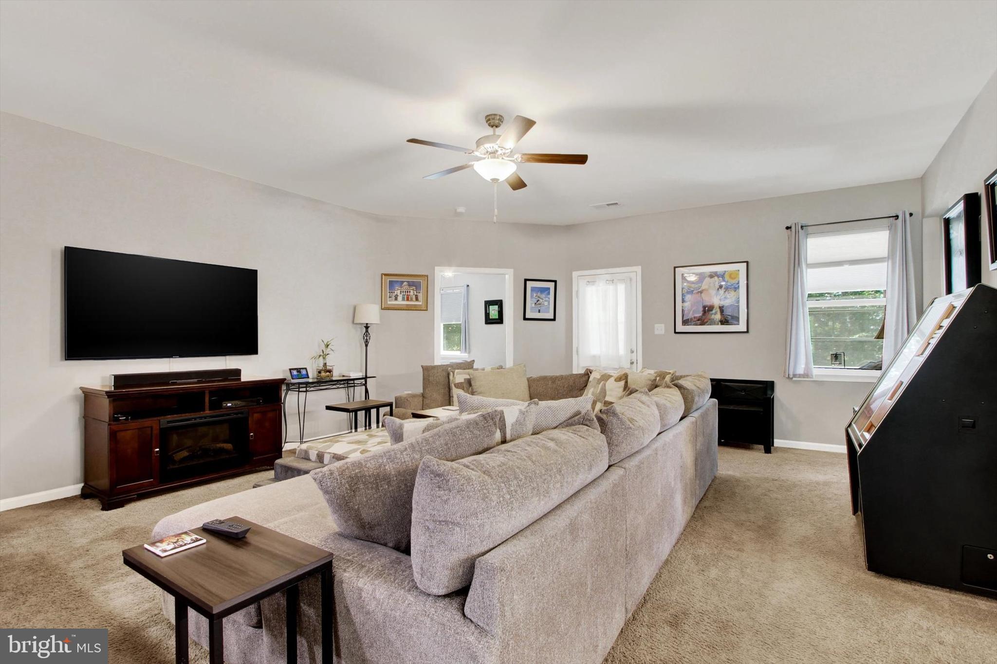 626 Ledger Drive Hanover, PA 17331 - Photo 10 of 37 a living room with furniture and a flat screen tv