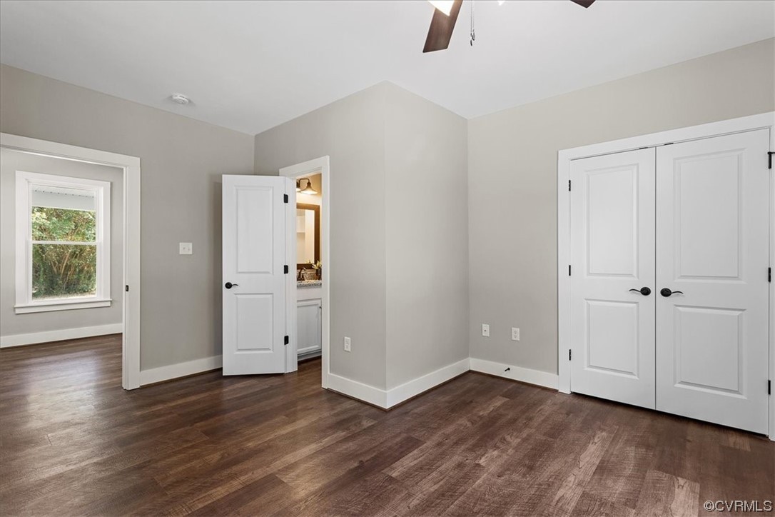6704 Courthouse Road Church Road, VA 23833 - Photo 12 of 27 an empty room with wooden floor and windows