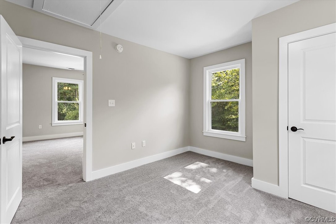 6704 Courthouse Road Church Road, VA 23833 - Photo 20 of 27 an empty room with windows and closet