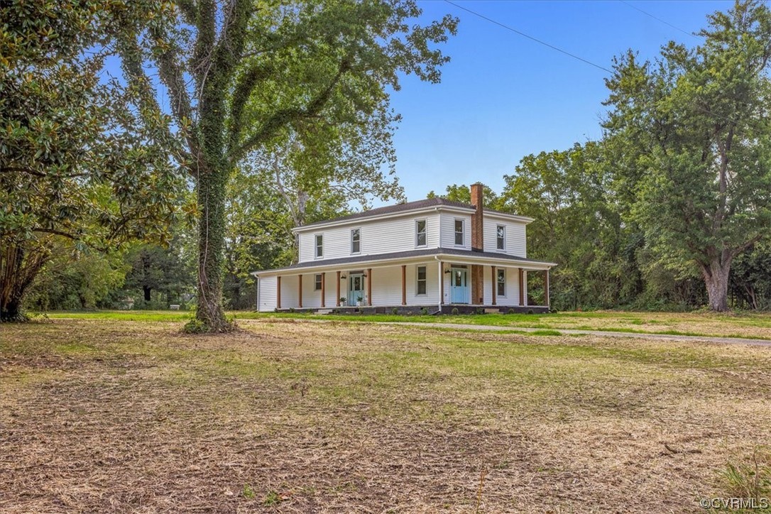 6704 Courthouse Road Church Road, VA 23833 - Photo 24 of 27 a big house with trees in front of it