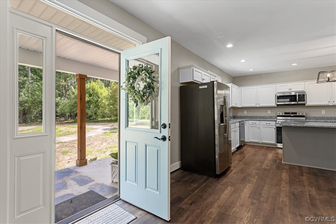 6704 Courthouse Road Church Road, VA 23833 - Photo 3 of 27 a kitchen with granite countertop a refrigerator and a sink